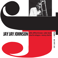Album cover for Jay Jay Johnson - The Eminent (Vol I) by Tandem Coffee Roasters features a black-and-white photo of a trombonist, bold black and red J shapes, and text listing tracks like Lover Man and Turnpike.