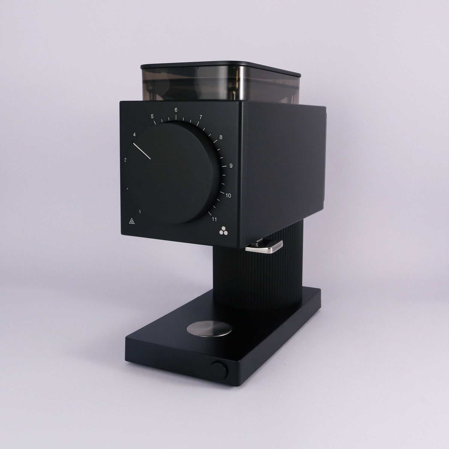 The Tandem Fellow Ode Brew Grinder Gen 2 features a modern black, square design with flat burrs, a transparent top hopper, and a large front grind size dial, displayed against a plain light background.