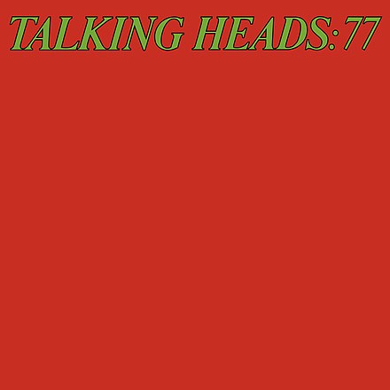 The Talking Heads - 77 coffee from Tandem Coffee Roasters features the product name in bold green and yellow on a vivid red background, creating a striking visual reminiscent of the album’s energetic vibe.