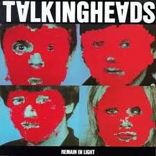 The Talking Heads - Remain in Light coffee by Tandem Coffee Roasters features an album-inspired design: four pixelated red-masked faces on a blue background, with the band name and title framing this energetic tribute.